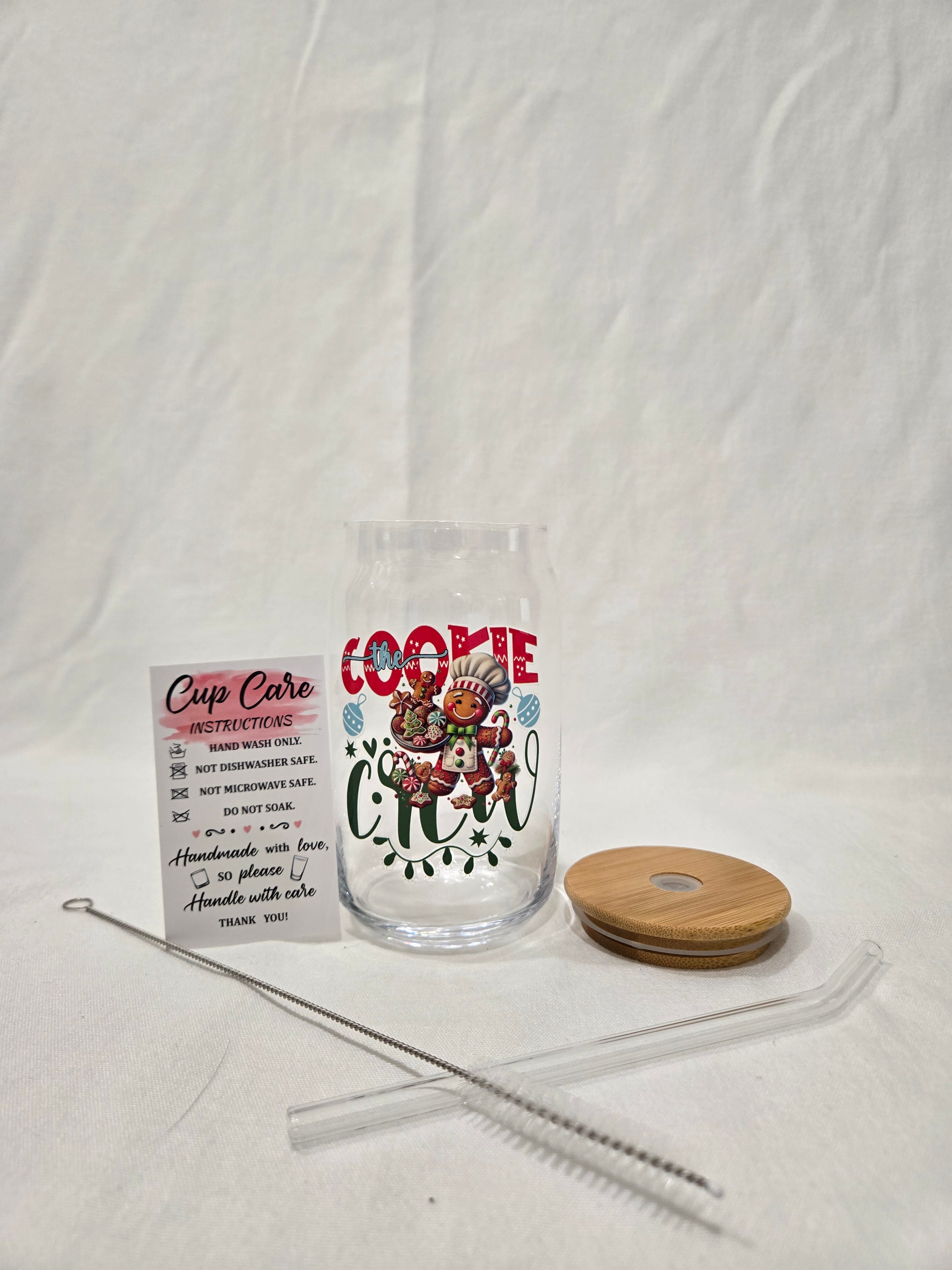 Christmas Glass Cup, 17.58 oz, "Cookie Crew" Gingerbread man wearing a bakers hat with cookies