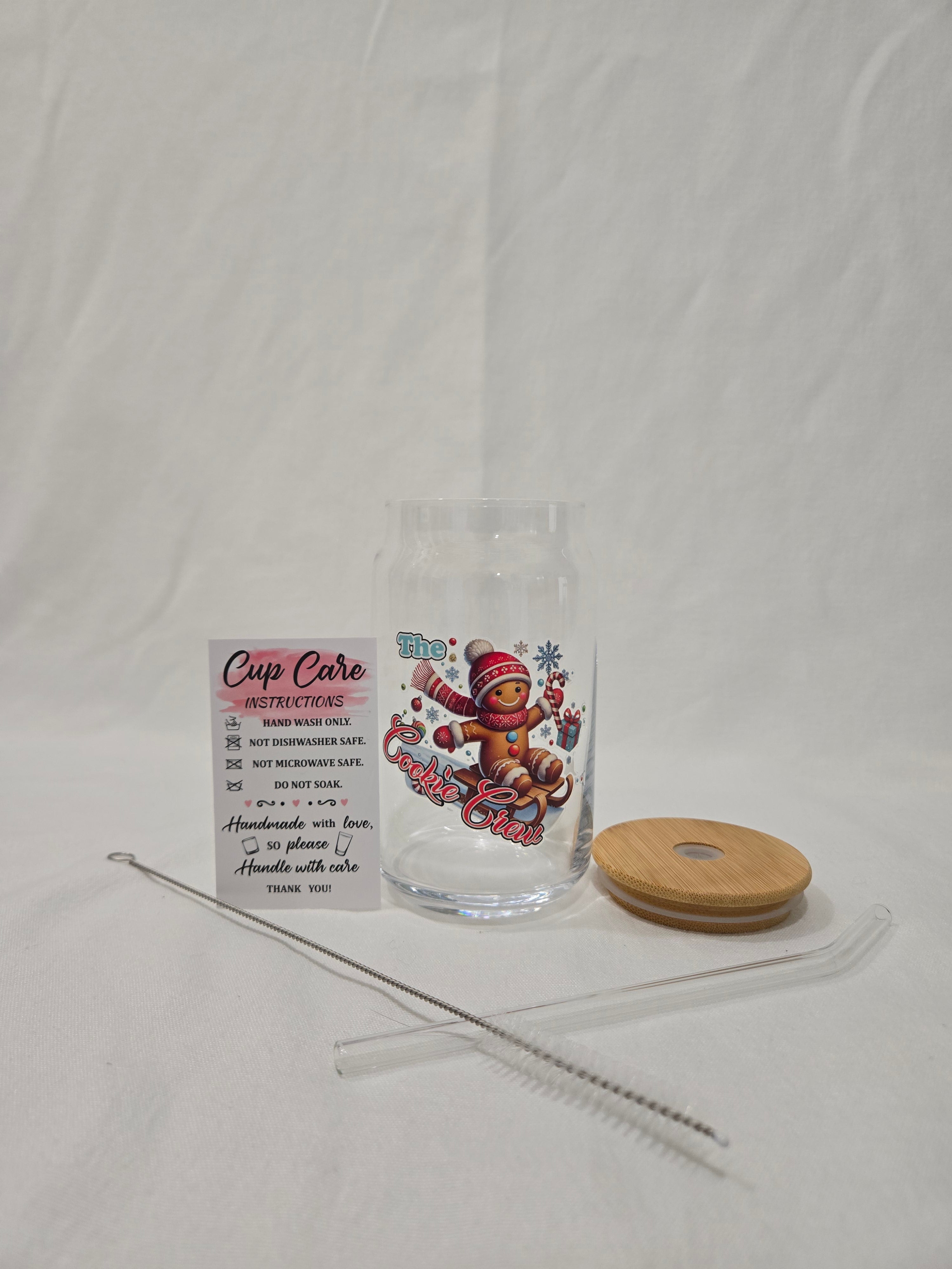 Christmas Glass Cup, 17.58 oz, Gingerbread man on a sled, wearing a red cap and scarf, "Cookie Crew"