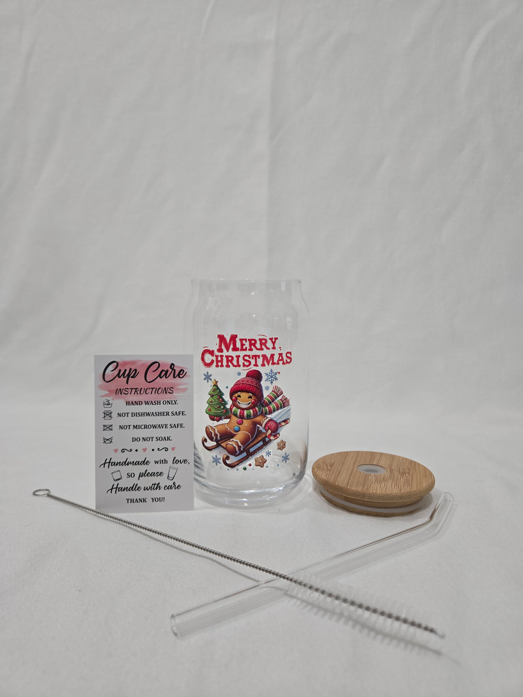 Christmas Glass cup, 17.58 oz, Gingerbread man on a sled with "Merry Christmas"