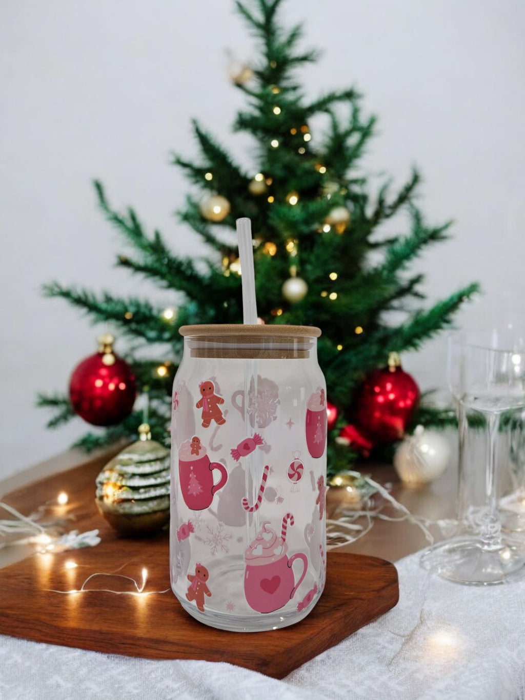 A Pink Winter glass cup, 17.58 oz, Hot Cocoa filled cups, peppermint candies and gingerbread