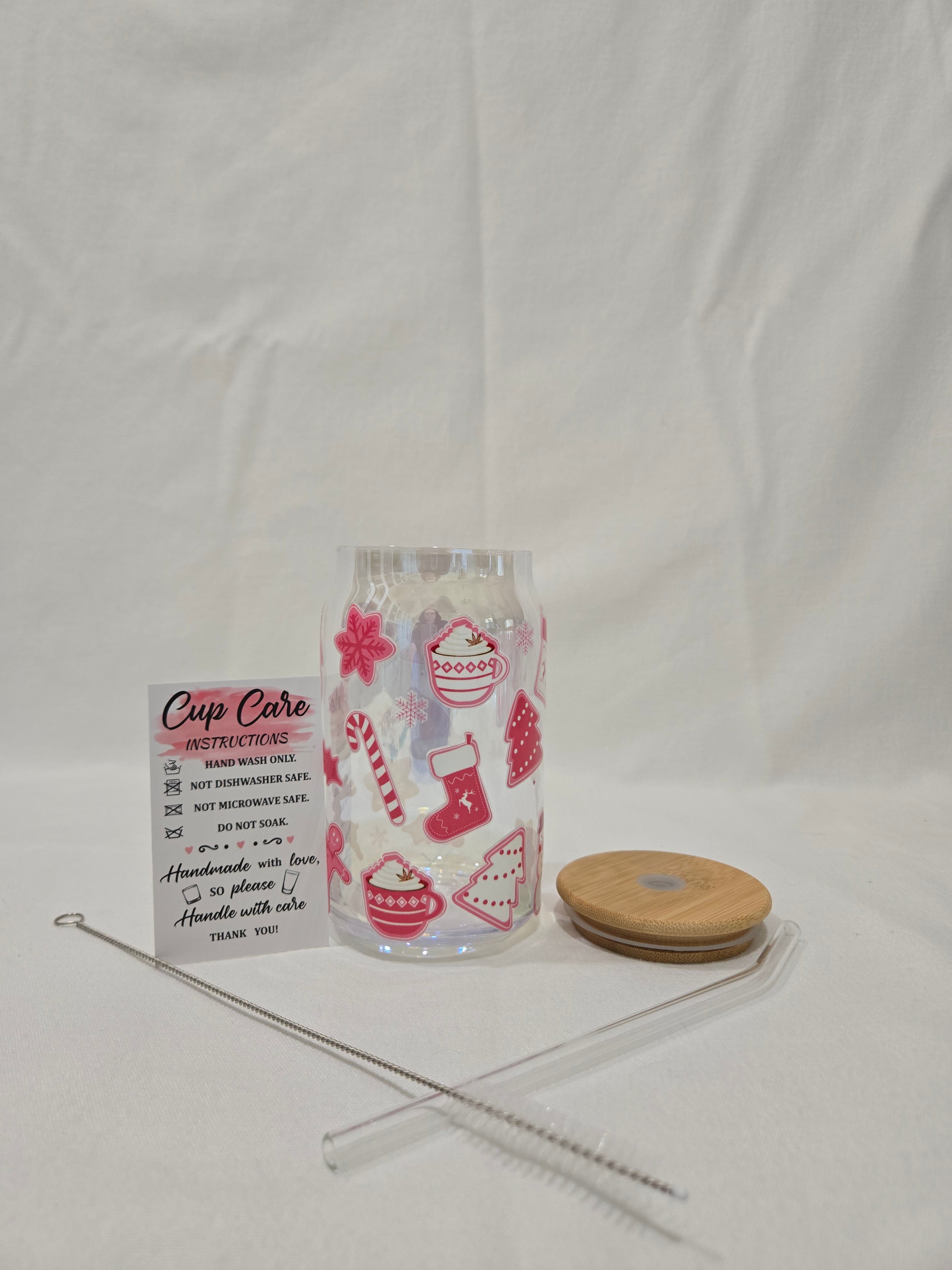 Winter Pink Glass Cup, 17.58 oz with Christmas Trees, Hot Cocoa, Candy Canes, Stockings and snowflakes.