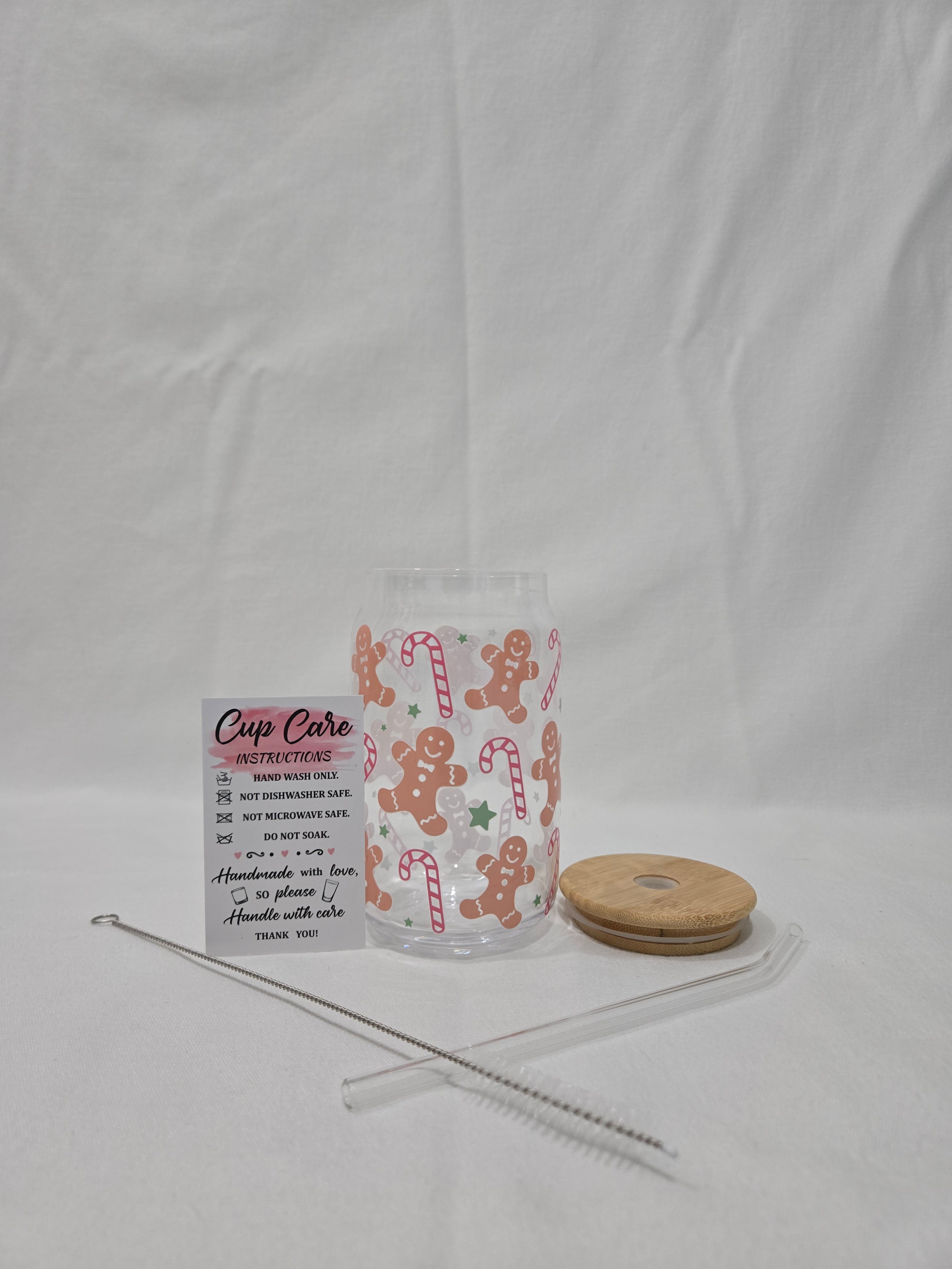 Winter Pink Glass Cup, 17.58 oz, Gingerbread men, candy canes, and stars