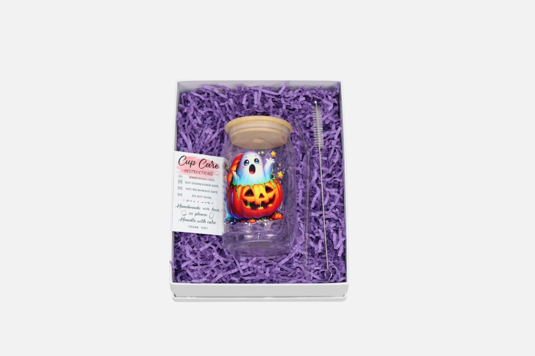 Ghost coming out of a Pumpkin Halloween glass cup